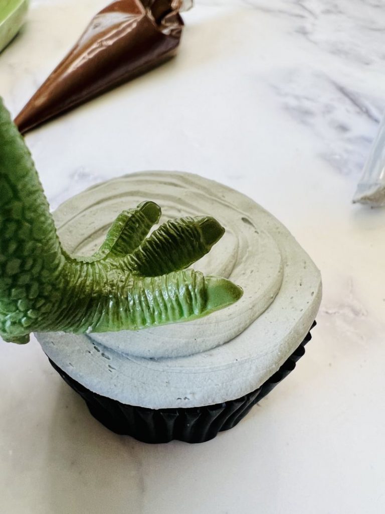 dinosaur foot well cupcake