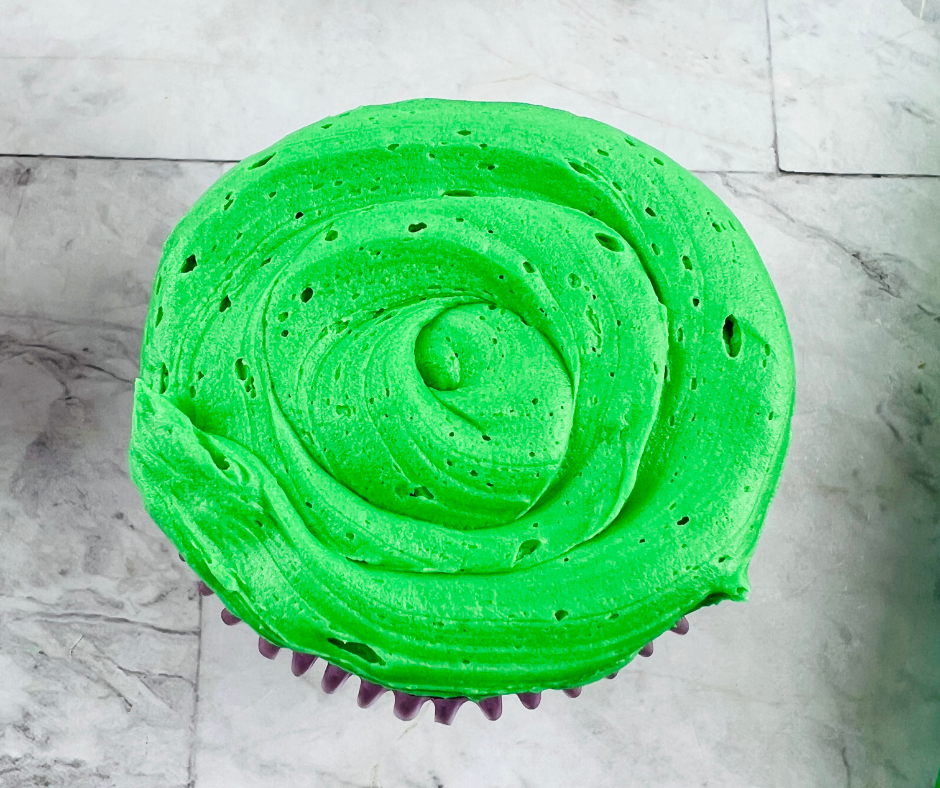 green frosted cupcake