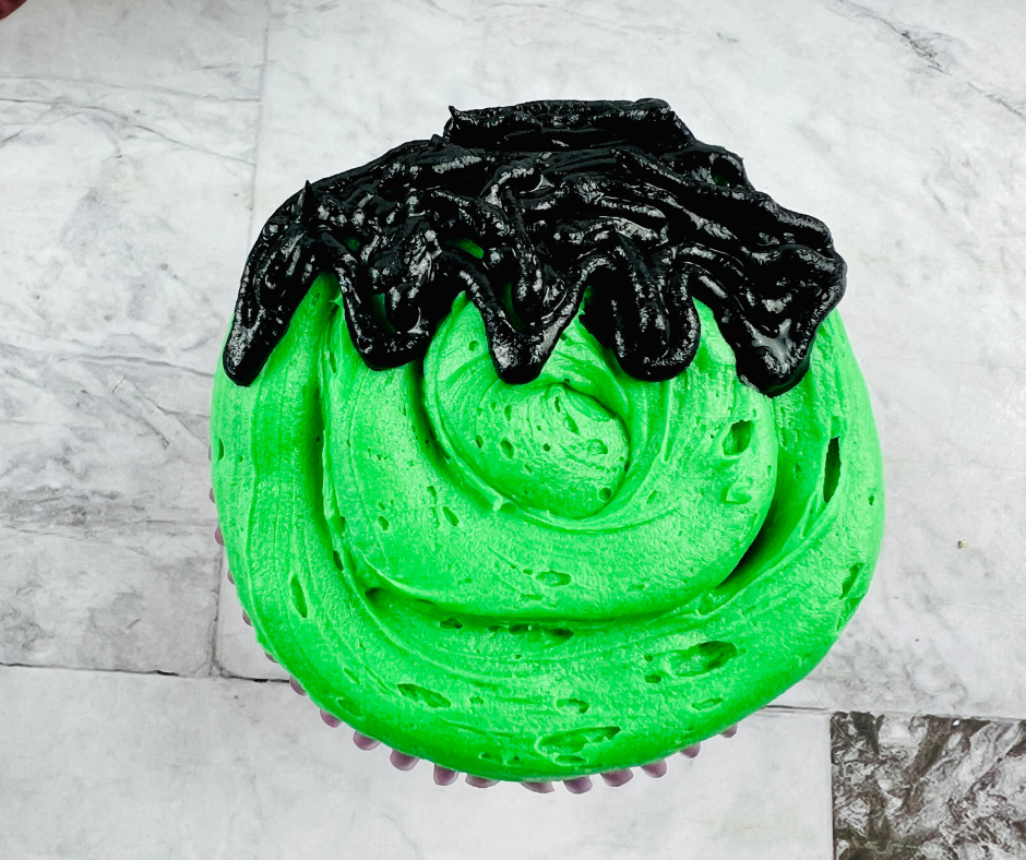hair on a green cupcake